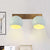 Macaron 2 Heads Wall Light Fixture Metal Blue Hemisphere Adjustable Sconce Ideas with Brass Backplate Blue Clearhalo 'Cast Iron' 'Glass' 'Industrial' 'Modern wall lights' 'Modern' 'Tiffany' 'Traditional wall lights' 'Wall Lamps & Sconces' 'Wall Lights' Lighting' 1789429