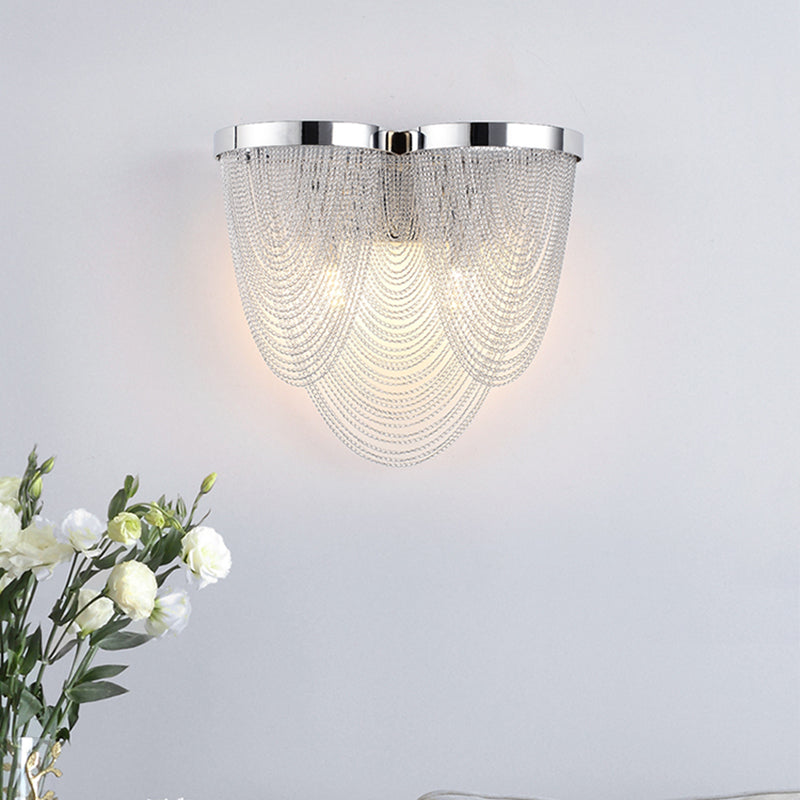 Silver Rippling Tassel Chain Wall Light Modern Vogue 2-Bulb Aluminum Sconce Lighting for Sitting Room Clearhalo 'Cast Iron' 'Glass' 'Industrial' 'Modern wall lights' 'Modern' 'Tiffany' 'Traditional wall lights' 'Wall Lamps & Sconces' 'Wall Lights' Lighting' 1789467