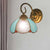 Tiffany Petal Shaped Sconce Light with Curved Arm 1 Light Glass Wall Light in Blue for Study Room Blue Clearhalo 'Industrial' 'Middle century wall lights' 'Tiffany wall lights' 'Tiffany' 'Wall Lamps & Sconces' 'Wall Lights' Lighting' 179111