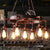 Dark Rust 7 Lights Pendant Light Farmhouse Wrought Iron Bell Cage Hanging Chandelier Lamp with Wheel Design Rust Clearhalo 'Cast Iron' 'Ceiling Lights' 'Chandeliers' 'Industrial Chandeliers' 'Industrial' 'Metal' 'Middle Century Chandeliers' 'Rustic Chandeliers' 'Tiffany' Lighting' 1796937