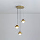 Metal Dome Multiple Lamp Pendant Simplicity 3-Bulb 12"/23.5" Width Brass Hanging Light Kit with Ball Opal Glass Shade Clearhalo 'Ceiling Lights' 'Modern Pendants' 'Modern' 'Pendant Lights' 'Pendants' Lighting' 1804625