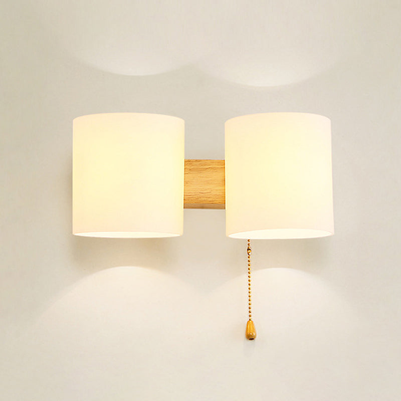 Opaline Glass Cylinder Wall Mount Lamp Modern 2 Lights Beige Wall Lighting Ideas with Pull Chain Clearhalo 'Modern wall lights' 'Modern' 'Wall Lamps & Sconces' 'Wall Lights' Lighting' 1804653