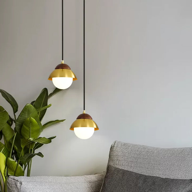 Dome Living Room Ceiling Pendant Metal 1 Bulb Minimalist Hanging Ceiling Light with Global White Glass Shade in Brass Clearhalo 'Ceiling Lights' 'Modern Pendants' 'Modern' 'Pendant Lights' 'Pendants' Lighting' 1804677