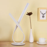 Ribbon Symbol Task Lamp Minimalist Metallic LED Bedside Night Table Light in White Clearhalo 'Lamps' 'Table Lamps' Lighting' 1804965