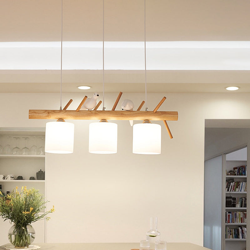 Beige Drum Island Lighting Ideas Simple 2/3 Heads Opaque Glass Pendant Lamp with Bird on Wood Branch Beam Design Clearhalo 'Ceiling Lights' 'Island Lights' Lighting' 1805167