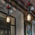 Industrial Wire Guard Hanging Light 1 Head Iron Hanging Lamp with Gauge and Valve in Black Finish Black Clearhalo 'Art Deco Pendants' 'Black' 'Cast Iron' 'Ceiling Lights' 'Ceramic' 'Crystal' 'Industrial Pendants' 'Industrial' 'Metal' 'Middle Century Pendants' 'Pendant Lights' 'Pendants' 'Rustic Pendants' 'Tiffany' Lighting' 185021