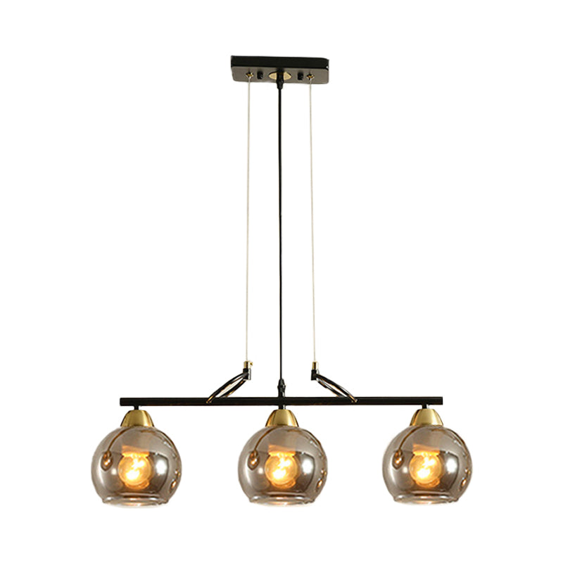 Sphere Dinning Hall Island Lighting Idea Clear/Smoke Gray Glass 3 Bulbs Contemporary Pendant Light Fixture Clearhalo 'Ceiling Lights' 'Close To Ceiling Lights' 'Glass shade' 'Glass' 'Island Lights' 'Pendant Lights' Lighting' 1865454