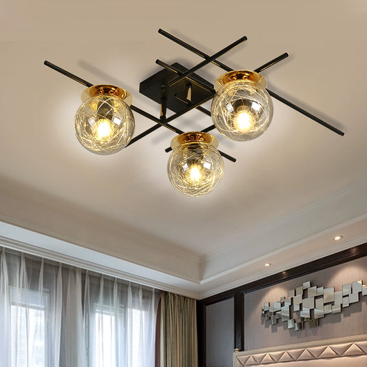 Minimal 3 Heads Semi Flush Light with Clear/Smoke Gray Glass Shade Black Ball Close to Ceiling Lamp for Bedchamber Smoke Gray Clearhalo 'Ceiling Lights' 'Close To Ceiling Lights' 'Close to ceiling' 'Glass shade' 'Glass' 'Island Lights' 'Semi-flushmount' Lighting' 1865601