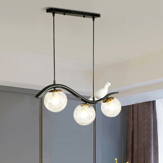 Ball Shade Hanging Lamp Kit Modernism Clear/White Glass 3 Heads Black Island Lighting with Pigeon Decor Clear Clearhalo 'Ceiling Lights' 'Close To Ceiling Lights' 'Glass shade' 'Glass' 'Island Lights' Lighting' 1865750