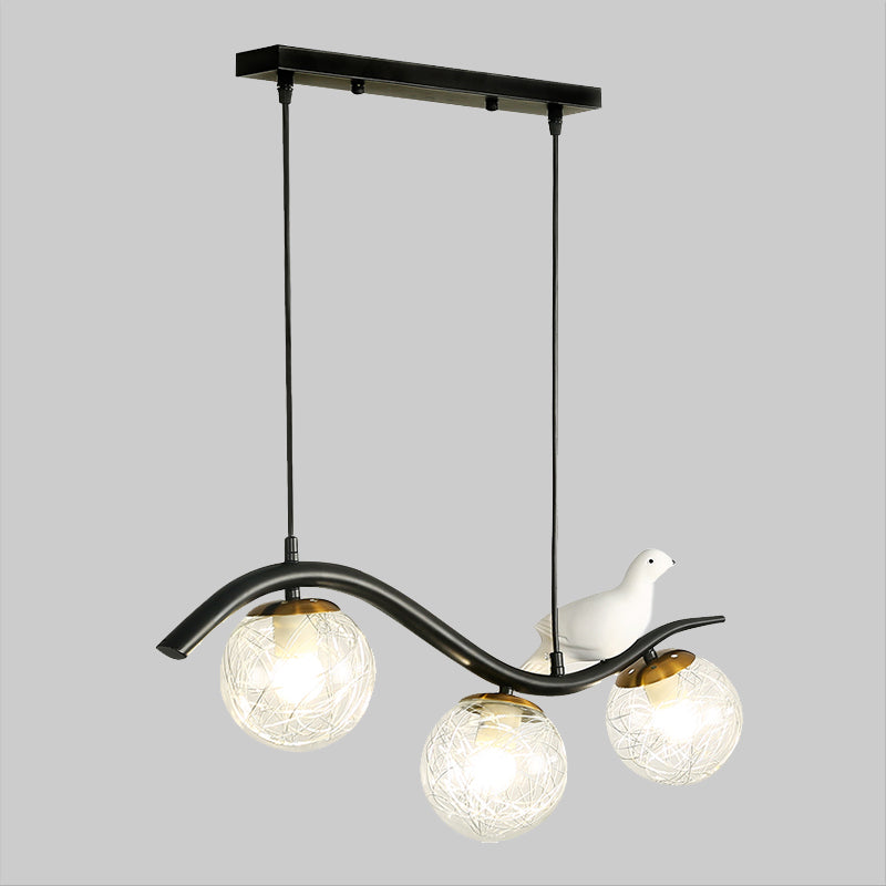 Ball Shade Hanging Lamp Kit Modernism Clear/White Glass 3 Heads Black Island Lighting with Pigeon Decor Clearhalo 'Ceiling Lights' 'Close To Ceiling Lights' 'Glass shade' 'Glass' 'Island Lights' Lighting' 1865752