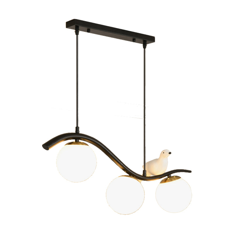 Ball Shade Hanging Lamp Kit Modernism Clear/White Glass 3 Heads Black Island Lighting with Pigeon Decor Clearhalo 'Ceiling Lights' 'Close To Ceiling Lights' 'Glass shade' 'Glass' 'Island Lights' Lighting' 1865756