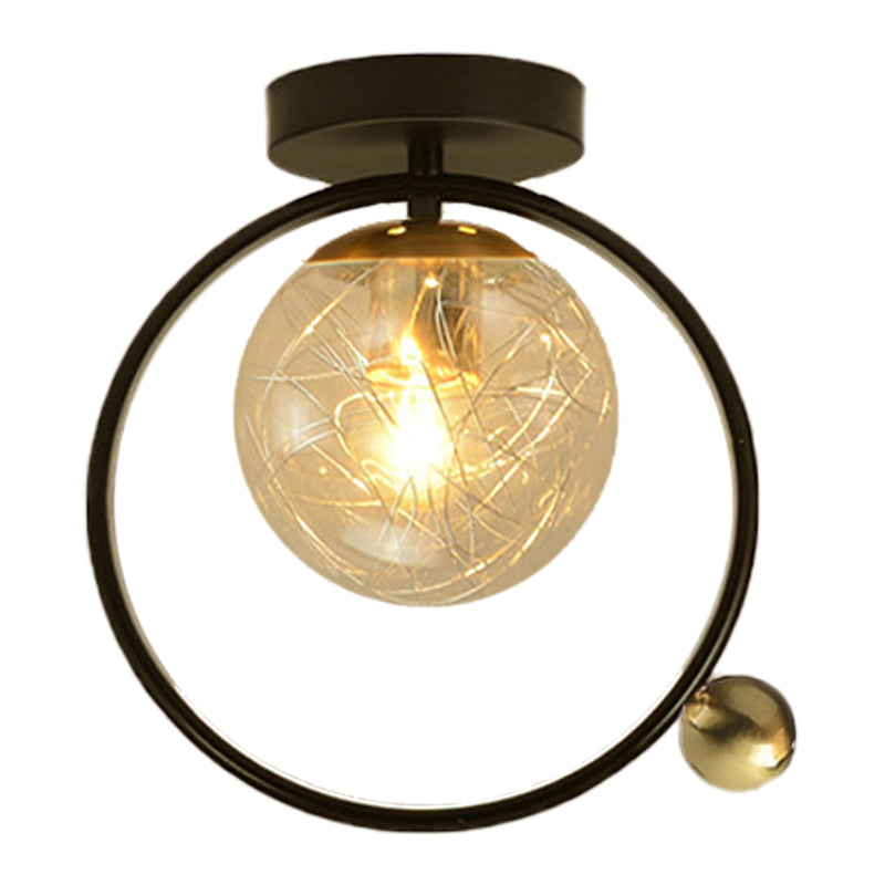 Spherical Semi Flush Light Contemporary Clear Glass Single Bulb Black Ceiling Mounted Fixture with Globe/Bird Decor Clearhalo 'Ceiling Lights' 'Close To Ceiling Lights' 'Close to ceiling' 'Glass shade' 'Glass' 'Pendant Lights' 'Semi-flushmount' Lighting' 1865783