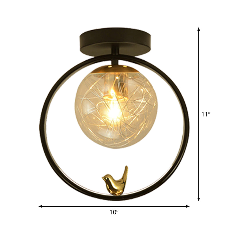 Spherical Semi Flush Light Contemporary Clear Glass Single Bulb Black Ceiling Mounted Fixture with Globe/Bird Decor Clearhalo 'Ceiling Lights' 'Close To Ceiling Lights' 'Close to ceiling' 'Glass shade' 'Glass' 'Pendant Lights' 'Semi-flushmount' Lighting' 1865790