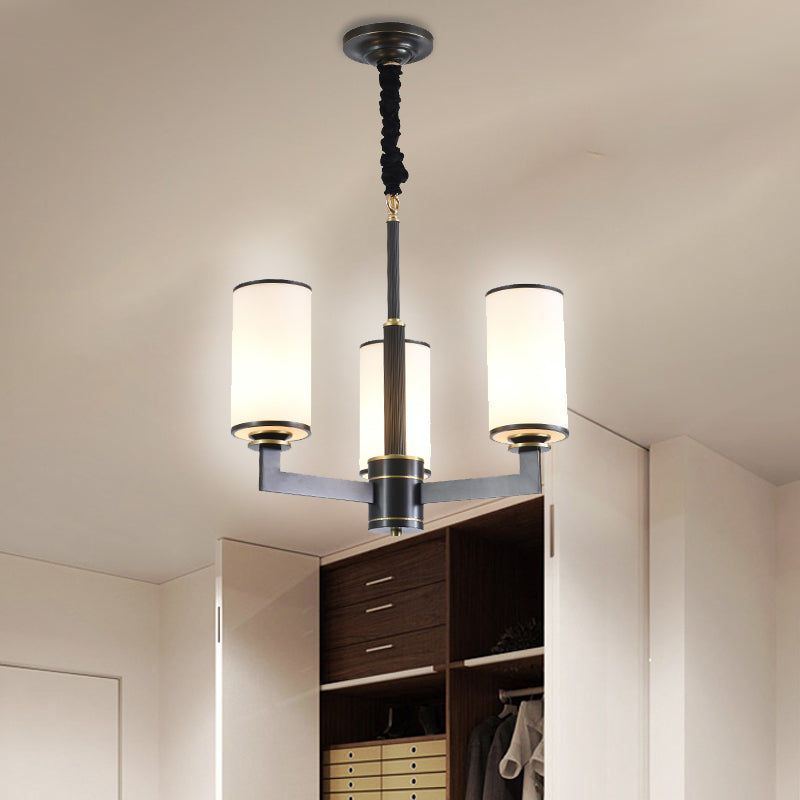 3 Heads Dinning Room Armed Chandelier Minimal Black Ceiling Hang Fixture with Cylinder Frosted White Glass Shade Black Clearhalo 'Ceiling Lights' 'Chandeliers' 'Modern Chandeliers' 'Modern' Lighting' 1865852