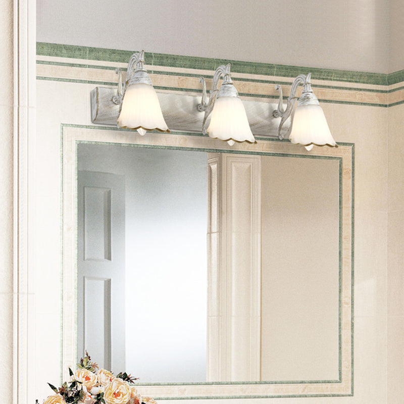 Floral Opal Glass Wall Light Fixture Simple 2/3-Light Bronze/Distressed White Wall Mounted Lighting with Curved Arm Clearhalo 'Cast Iron' 'Glass' 'Industrial' 'Modern wall lights' 'Modern' 'Tiffany' 'Traditional wall lights' 'Vanity Lights' 'Wall Lights' Lighting' 1866672