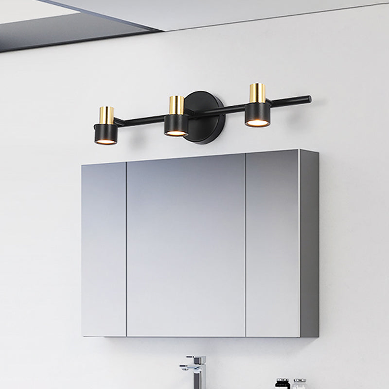 Black Cylinder Wall Light Minimalist 3 Heads Metallic Wall Mounted Vanity Lamp in Warm/White/Natural Light Clearhalo 'Cast Iron' 'Glass' 'Industrial' 'Modern wall lights' 'Modern' 'Tiffany' 'Traditional wall lights' 'Vanity Lights' 'Wall Lights' Lighting' 1867324