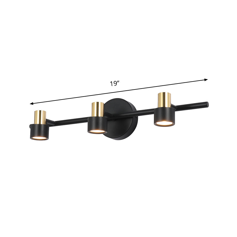 Black Cylinder Wall Light Minimalist 3 Heads Metallic Wall Mounted Vanity Lamp in Warm/White/Natural Light Clearhalo 'Cast Iron' 'Glass' 'Industrial' 'Modern wall lights' 'Modern' 'Tiffany' 'Traditional wall lights' 'Vanity Lights' 'Wall Lights' Lighting' 1867326