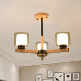 Double Glass Cylinder Shade Hanging Chandelier 3/6 Light Wooden Ceiling Lamp for Living Room 3 Black Clearhalo 'Carpenter Chandeliers' 'Ceiling Lights' 'Chandeliers' 'Industrial' 'Modern Chandeliers' 'Modern' Lighting' 1871710