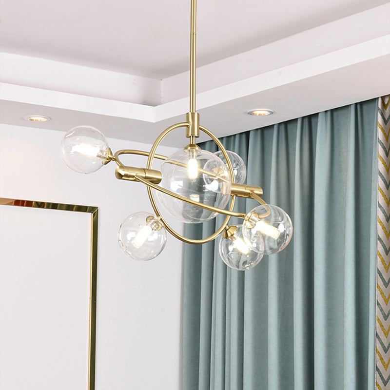Gold Concentric Ring Pendant Light with Sphere Shade Amber/Clear/Smoke Glass Contemporary Chandelier for Living Room 6 Clear Clearhalo 'Ceiling Lights' 'Chandeliers' 'Clear' 'Glass shade' 'Glass' 'Industrial' 'Modern Chandeliers' 'Modern' 'Tiffany' 'Traditional Chandeliers' Lighting' 189594