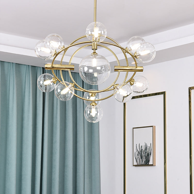 Gold Concentric Ring Pendant Light with Sphere Shade Amber/Clear/Smoke Glass Contemporary Chandelier for Living Room 12 Clear Clearhalo 'Ceiling Lights' 'Chandeliers' 'Clear' 'Glass shade' 'Glass' 'Industrial' 'Modern Chandeliers' 'Modern' 'Tiffany' 'Traditional Chandeliers' Lighting' 189597