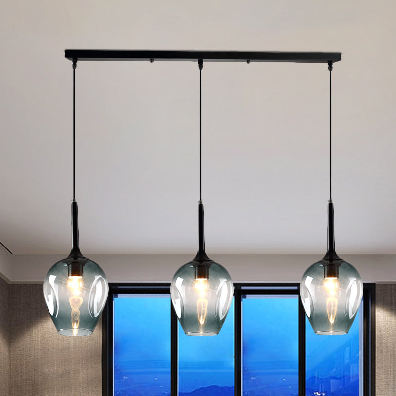 Tulip Cluster Pendant Lamp with Linear Design Modern Amber/Smoke/Blue Glass 3 Lights Black Ceiling Hung Light Clearhalo 'Ceiling Lights' 'Chandeliers' 'Glass shade' 'Glass' 'Modern Pendants' 'Modern' 'Pendant Lights' 'Pendants' Lighting' 1903437