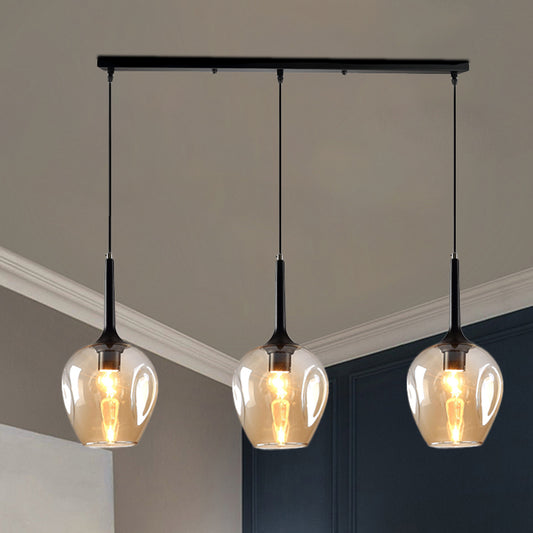 Tulip Cluster Pendant Lamp with Linear Design Modern Amber/Smoke/Blue Glass 3 Lights Black Ceiling Hung Light Clearhalo 'Ceiling Lights' 'Chandeliers' 'Glass shade' 'Glass' 'Modern Pendants' 'Modern' 'Pendant Lights' 'Pendants' Lighting' 1903449