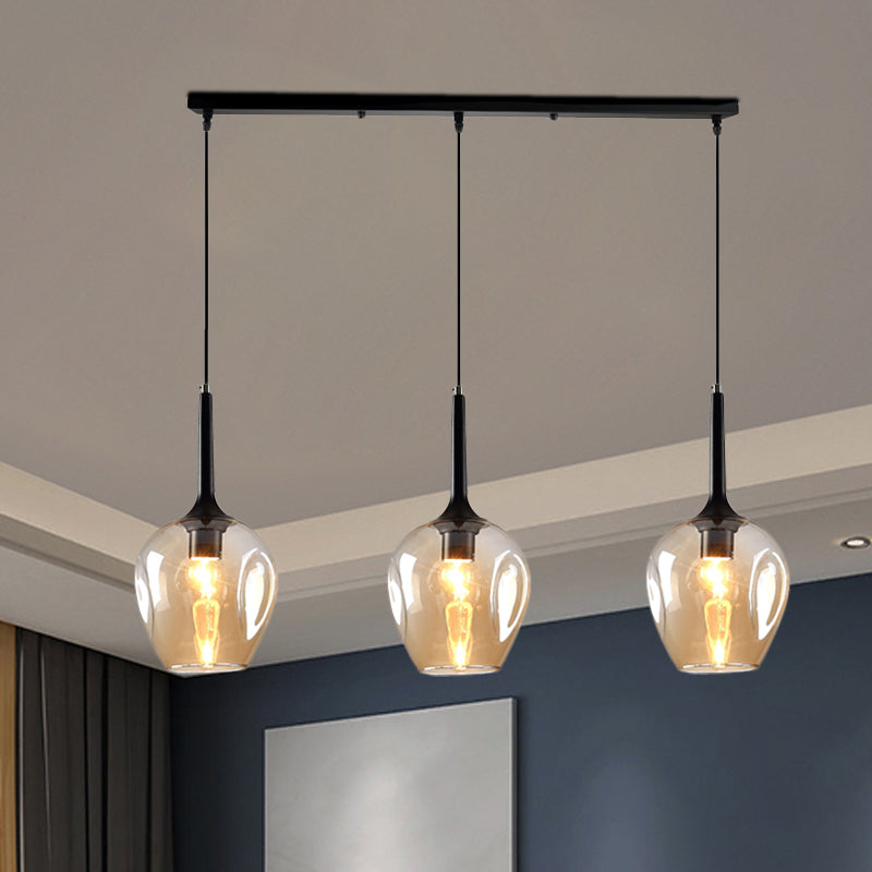 Tulip Cluster Pendant Lamp with Linear Design Modern Amber/Smoke/Blue Glass 3 Lights Black Ceiling Hung Light Clearhalo 'Ceiling Lights' 'Chandeliers' 'Glass shade' 'Glass' 'Modern Pendants' 'Modern' 'Pendant Lights' 'Pendants' Lighting' 1903450