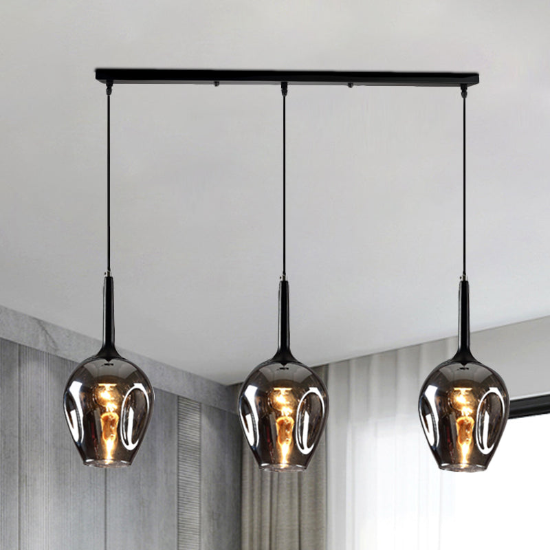 Tulip Cluster Pendant Lamp with Linear Design Modern Amber/Smoke/Blue Glass 3 Lights Black Ceiling Hung Light Clearhalo 'Ceiling Lights' 'Chandeliers' 'Glass shade' 'Glass' 'Modern Pendants' 'Modern' 'Pendant Lights' 'Pendants' Lighting' 1903453