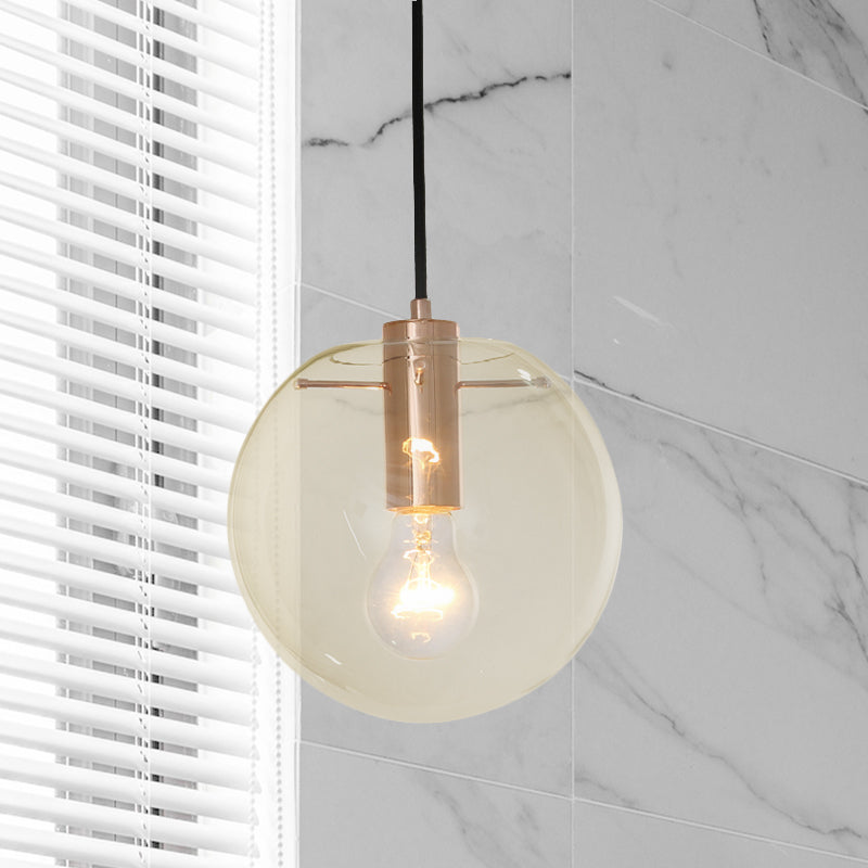 Clear/Amber Glass Round Pendant Light Contemporary 1 Light Hanging Ceiling Lamp in Rose Gold Clearhalo 'Ceiling Lights' 'Glass shade' 'Glass' 'Pendant Lights' 'Pendants' Lighting' 1903568