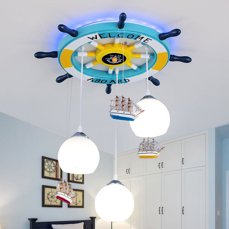 Globe Down Lighting Nautical Opaque Glass 3 Heads Nursery Multiple Lamp Pendant with Rudder Canopy in White Ocean Blue Clearhalo 'Ceiling Lights' 'Close To Ceiling Lights' 'Glass shade' 'Glass' 'Pendant Lights' 'Pendants' Lighting' 1907771
