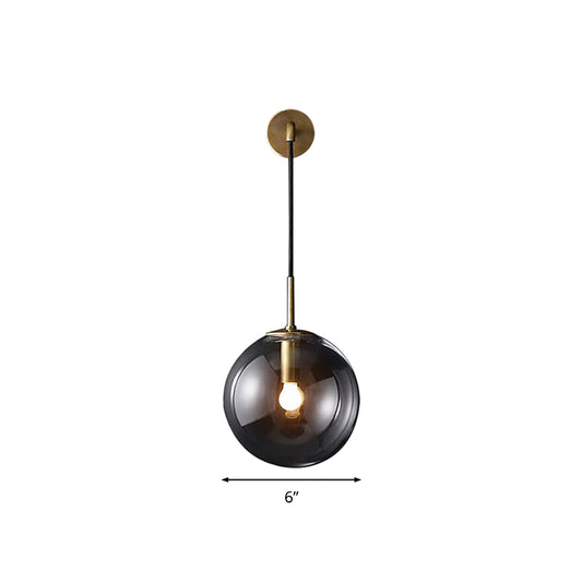 Modern Spherical Wall Lighting Fixture 1 Bulb Smoked Glass Sconce Light in Black/Brass for Living Room, 8"/10" Clearhalo 'Cast Iron' 'Glass' 'Industrial wall lights' 'Industrial' 'Middle century wall lights' 'Modern' 'Tiffany' 'Traditional wall lights' 'Wall Lamps & Sconces' 'Wall Lights' Lighting' 1910545