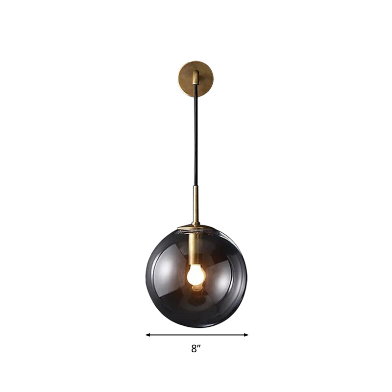 Modern Spherical Wall Lighting Fixture 1 Bulb Smoked Glass Sconce Light in Black/Brass for Living Room, 8"/10" Clearhalo 'Cast Iron' 'Glass' 'Industrial wall lights' 'Industrial' 'Middle century wall lights' 'Modern' 'Tiffany' 'Traditional wall lights' 'Wall Lamps & Sconces' 'Wall Lights' Lighting' 1910546