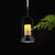 Faux Candle Wine Bar Pendant Lamp Rural Marble 1-Light Black Hanging Light Fixture with Arched Frame and Rope Detail Black Clearhalo 'Art Deco Pendants' 'Black' 'Cast Iron' 'Ceiling Lights' 'Ceramic' 'Crystal' 'Industrial Pendants' 'Industrial' 'Metal' 'Middle Century Pendants' 'Pendant Lights' 'Pendants' 'Rustic Pendants' 'Tiffany' Lighting' 1912563