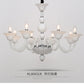 Vintage Curvy Arm Chandelier Lighting 6 Heads Clear/White/Black Glass Hanging Pendant Lamp in Chrome for Living Room White Clearhalo 'Ceiling Lights' 'Chandeliers' Lighting' options 1913432_45f6cccf-be8e-450a-8dd7-66489737f45f