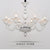 Vintage Curvy Arm Chandelier Lighting 6 Heads Clear/White/Black Glass Hanging Pendant Lamp in Chrome for Living Room White Clearhalo 'Ceiling Lights' 'Chandeliers' Lighting' options 1913432_45f6cccf-be8e-450a-8dd7-66489737f45f