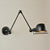 1-Light Bowl Rotatable Task Wall Light Industrial Black Iron Wall Mount Light Fixture with Frame Guard Black Clearhalo 'Art deco wall lights' 'Cast Iron' 'Glass' 'Industrial wall lights' 'Industrial' 'Middle century wall lights' 'Modern' 'Rustic wall lights' 'Tiffany' 'Traditional wall lights' 'Wall Lamps & Sconces' 'Wall Lights' Lighting' 1916837
