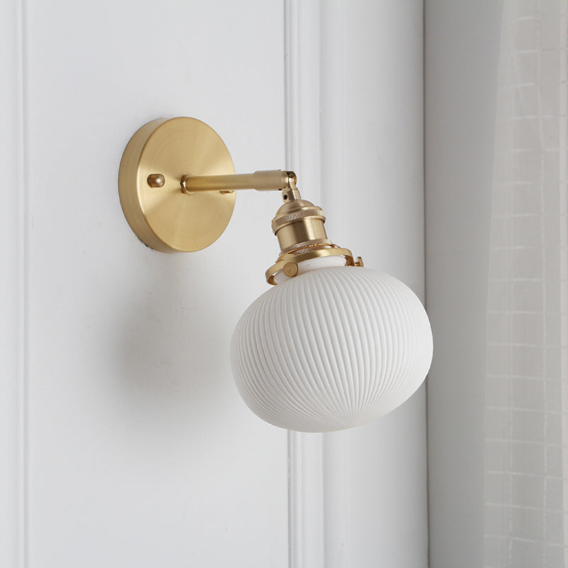 Elliptical Ribbed Ceramic Wall Light Kit Country Style 1 Head Kitchen Rotatable Wall Mounted Lamp in Brass Clearhalo 'Art deco wall lights' 'Industrial wall lights' 'Industrial' 'Middle century wall lights' 'Tiffany' 'Wall Lamps & Sconces' 'Wall Lights' Lighting' 1918638
