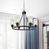 6-Light Wagon Wheel Chandelier Pendant Rustic Black Iron Ceiling Hang Light with Cylinder Clear Glass Shade Clearhalo 'Cast Iron' 'Ceiling Lights' 'Chandeliers' 'Industrial Chandeliers' 'Industrial' 'Metal' 'Middle Century Chandeliers' 'Rustic Chandeliers' 'Tiffany' Lighting' 1918782