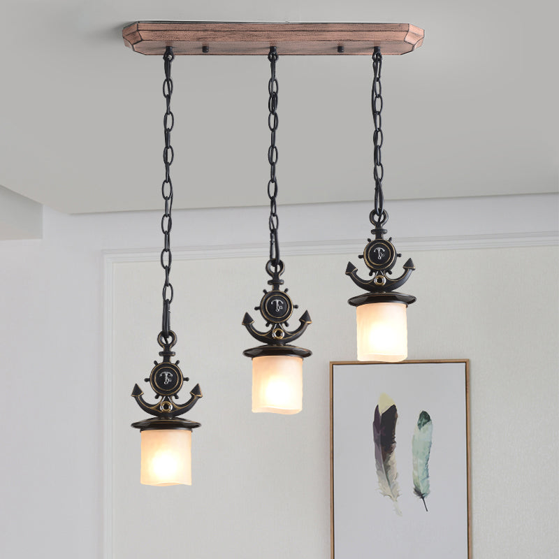 Black Cylinder Suspension Lamp Creative 3 Lights Opaque Glass Multi Pendant with Anchor Chain, Linear/Round Canopy Black Linear Clearhalo 'Ceiling Lights' 'Glass shade' 'Glass' 'Pendant Lights' 'Pendants' Lighting' 1933903
