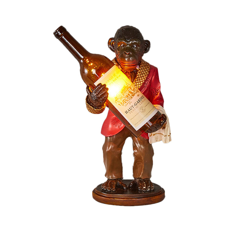 1-Light Desk Lamp Retro Gorilla Holding Wine Amber Glass Night Table Lighting in Red/Gold Clearhalo 'Lamps' 'Table Lamps' Lighting' 1934205