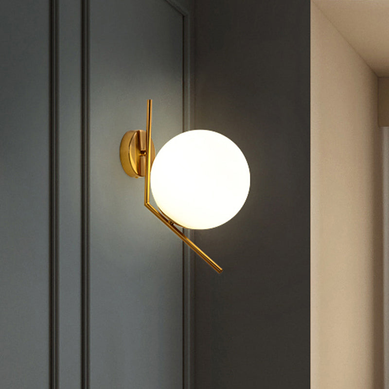 Gold Mini Globe Wall Sconce Light Simple 1-Light Opaline Glass Wall Mount Fixture for Bedroom Clearhalo 'Cast Iron' 'Glass' 'Industrial' 'Modern wall lights' 'Modern' 'Tiffany' 'Traditional wall lights' 'Wall Lamps & Sconces' 'Wall Lights' Lighting' 1936599