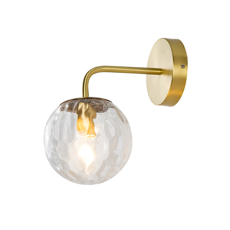 Ball Shaped Wall Lamp Minimalist Clear Rippling Glass 1-Light Bedroom Wall Mounted Lighting with Bent Arm in Black/Gold Clearhalo 'Cast Iron' 'Glass' 'Industrial' 'Modern wall lights' 'Modern' 'Tiffany' 'Traditional wall lights' 'Wall Lamps & Sconces' 'Wall Lights' Lighting' 1936629