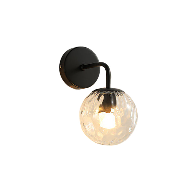 Ball Shaped Wall Lamp Minimalist Clear Rippling Glass 1-Light Bedroom Wall Mounted Lighting with Bent Arm in Black/Gold Clearhalo 'Cast Iron' 'Glass' 'Industrial' 'Modern wall lights' 'Modern' 'Tiffany' 'Traditional wall lights' 'Wall Lamps & Sconces' 'Wall Lights' Lighting' 1936632