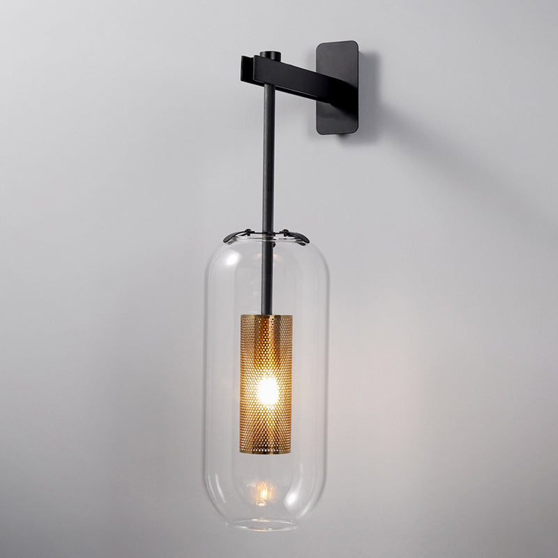 Postmodern Capsule Wall Hanging Light Clear Glass 1 Bulb Bedside Wall Mounted Lamp with Interior Mesh Guard in Black/Gold Clearhalo 'Cast Iron' 'Glass' 'Industrial' 'Modern wall lights' 'Modern' 'Tiffany' 'Traditional wall lights' 'Wall Lamps & Sconces' 'Wall Lights' Lighting' 1936757