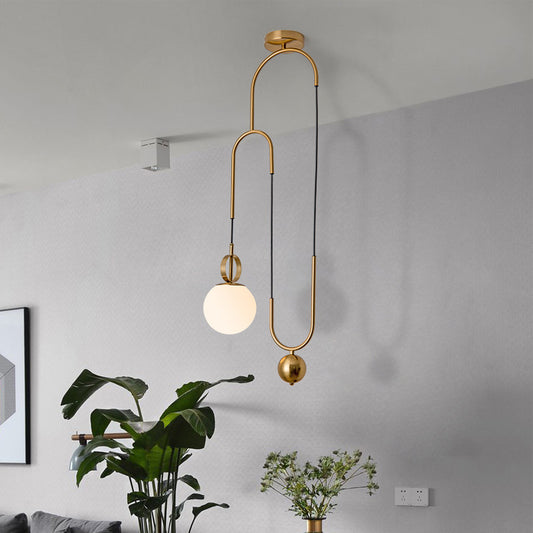 Opaline Glass Ball Shade Pendant Light Kit Postmodern 1-Light Hanging Lamp with Pulley in Gold Clearhalo 'Ceiling Lights' 'Modern Pendants' 'Modern' 'Pendant Lights' 'Pendants' Lighting' 1936826