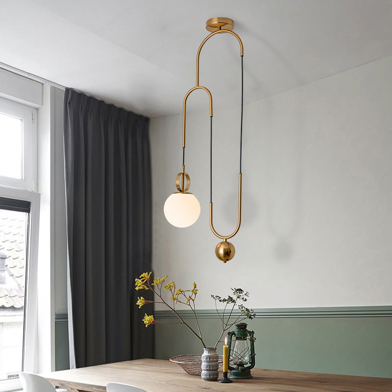 Opaline Glass Ball Shade Pendant Light Kit Postmodern 1-Light Hanging Lamp with Pulley in Gold Clearhalo 'Ceiling Lights' 'Modern Pendants' 'Modern' 'Pendant Lights' 'Pendants' Lighting' 1936827