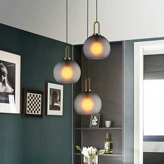 Frosted Smoky Grey Glass Sphere Pendant Modern Single-Bulb Brass Ceiling Hang Light with Handle, 8"/10"/12" Wide Smoke Gray Clearhalo 'Ceiling Lights' 'Modern Pendants' 'Modern' 'Pendant Lights' 'Pendants' Lighting' 1937062