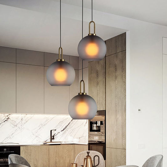 Frosted Smoky Grey Glass Sphere Pendant Modern Single-Bulb Brass Ceiling Hang Light with Handle, 8"/10"/12" Wide Clearhalo 'Ceiling Lights' 'Modern Pendants' 'Modern' 'Pendant Lights' 'Pendants' Lighting' 1937063