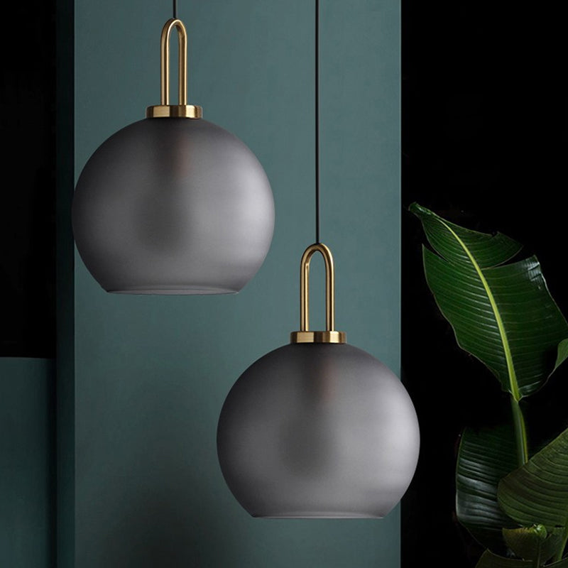 Frosted Smoky Grey Glass Sphere Pendant Modern Single-Bulb Brass Ceiling Hang Light with Handle, 8"/10"/12" Wide Clearhalo 'Ceiling Lights' 'Modern Pendants' 'Modern' 'Pendant Lights' 'Pendants' Lighting' 1937064