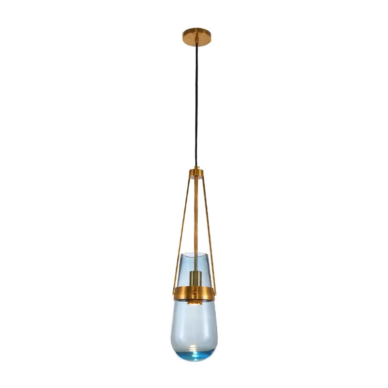 Drop Shaped Dining Room Hanging Lamp Clear/Blue Glass 1 Light Postmodern Pendulum Light with Gripper in Brass Clearhalo 'Ceiling Lights' 'Modern Pendants' 'Modern' 'Pendant Lights' 'Pendants' Lighting' 1937117
